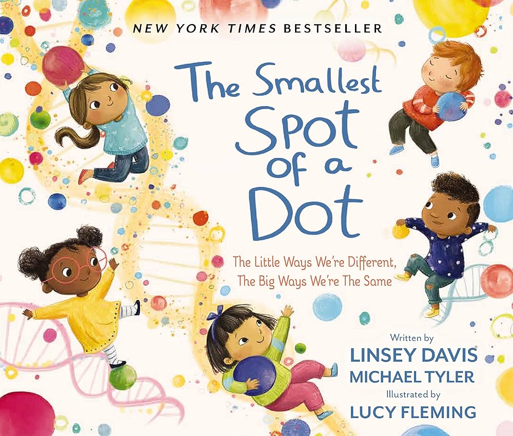 Cover of the book "The Smallest Spot of a Dot" by Linsey Davis and Michael Tyler, illustrated by Lucy Fleming. It features diverse children playing with colorful dots on a white background, reminiscent of notes in a joyful piece of music. The subtitle reads, "The Little Ways We're Different, The Big Ways We're The Same.